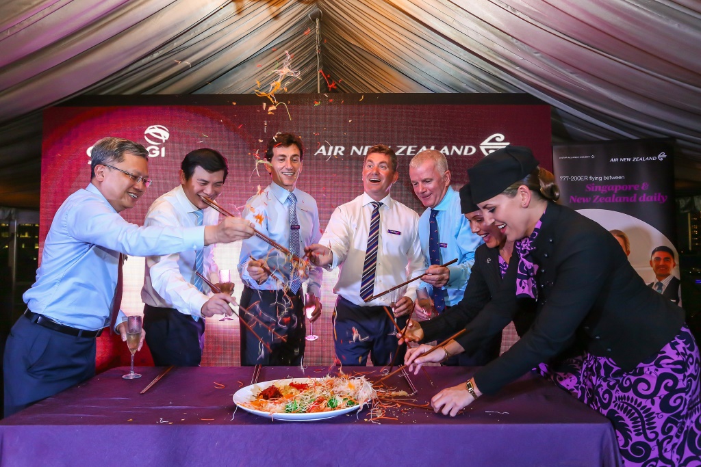 Air New Zealand executives and guests join in the Chinese New Year festivities with the Prosperity Toss or ‘Lo Hei’, for success and good fortune